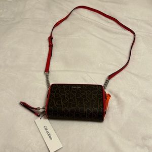 Calvin Klein red and black purse.